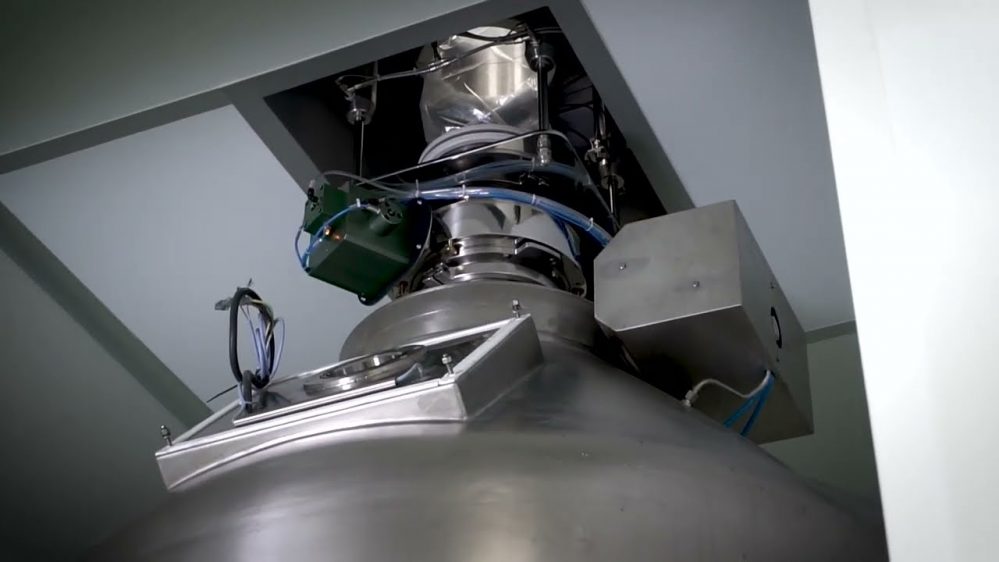 charging system via split valve of rotary dryer